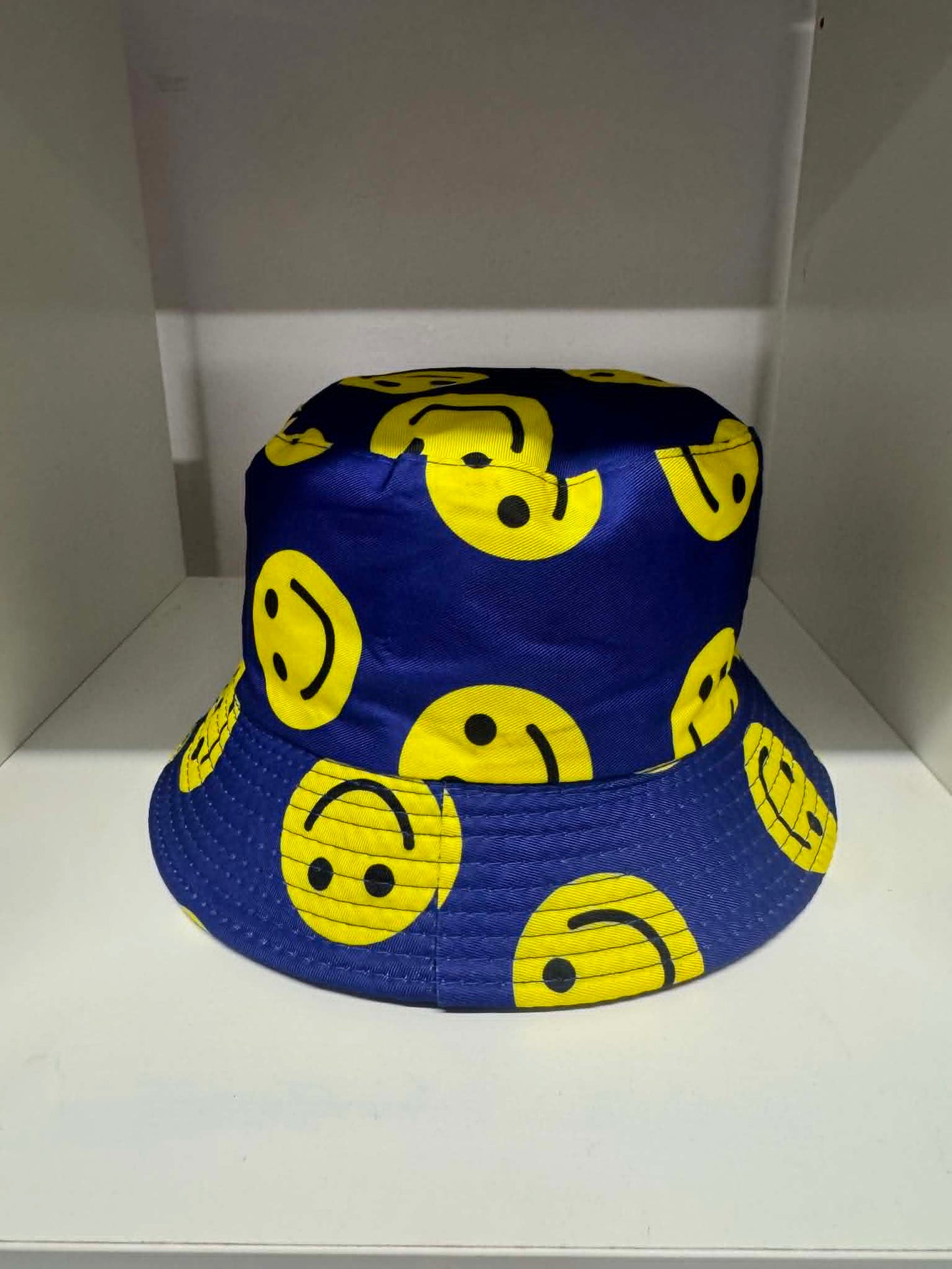 Blue all-over smiley face print bucket hat | Novelty hats Belfast NI