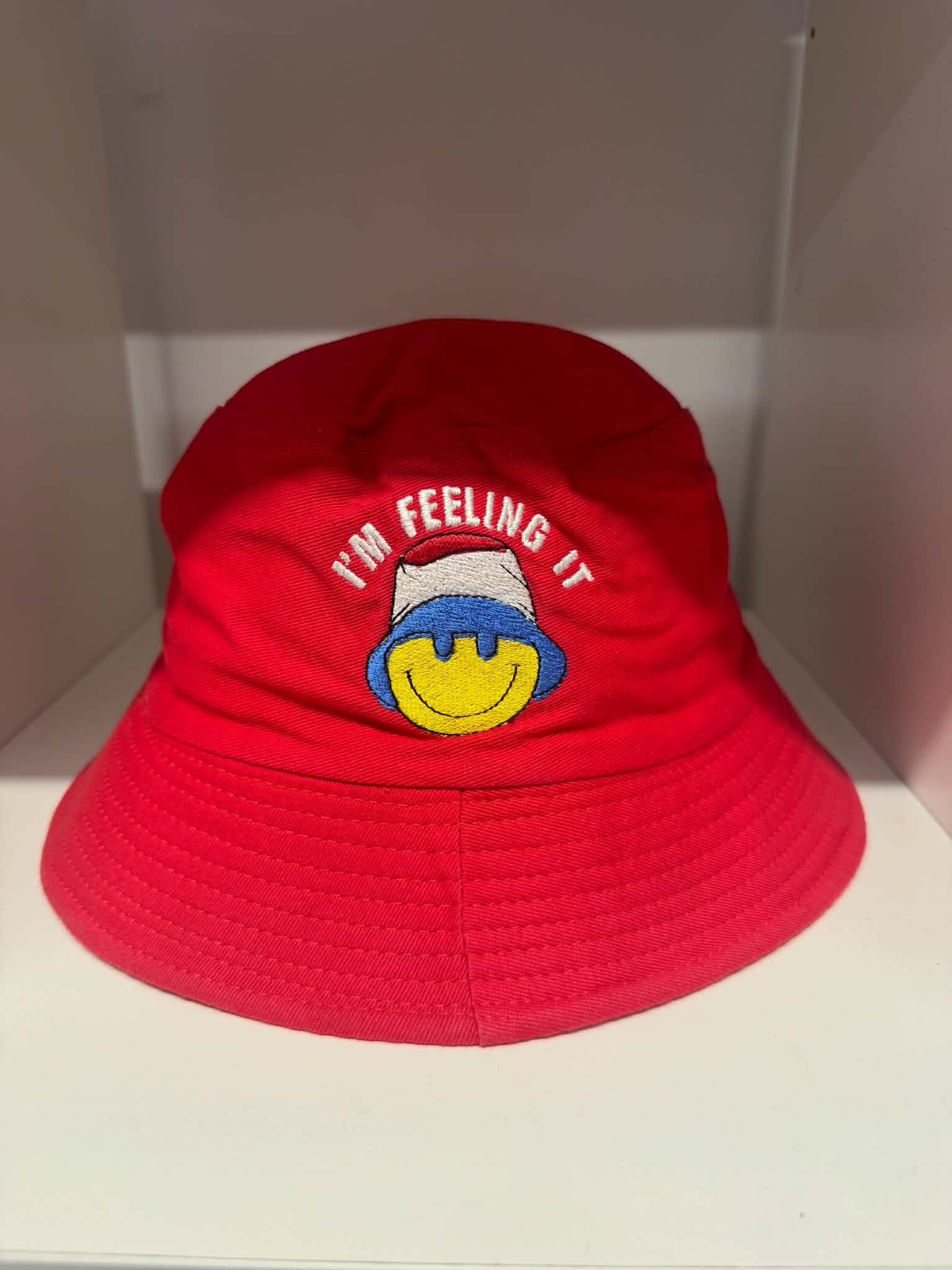 Red Im Feeling It smiley face bucket hat | Festival hats Belfast NI
