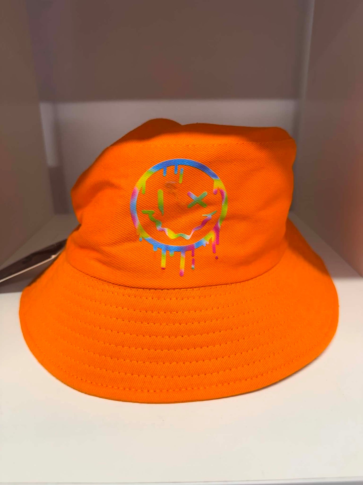 Orange drip smiley face bucket hat | Festival hats Belfast NI