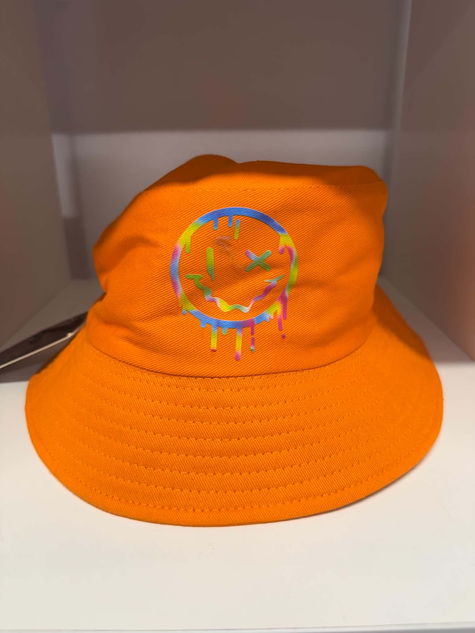 Orange drip smiley face bucket hat | Festival hats Belfast NI